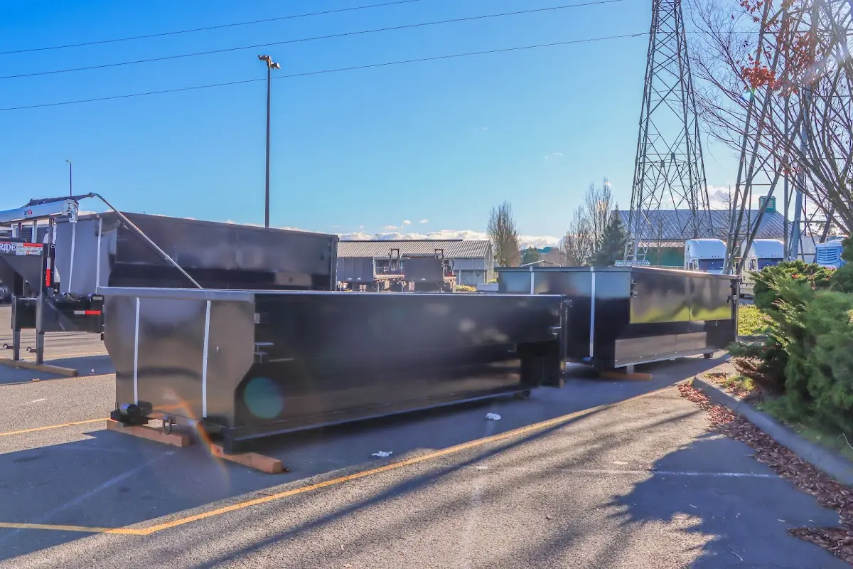 Roll-off dumpster ready for waste disposal at job site for Demolition Dumpster Rental in Bath